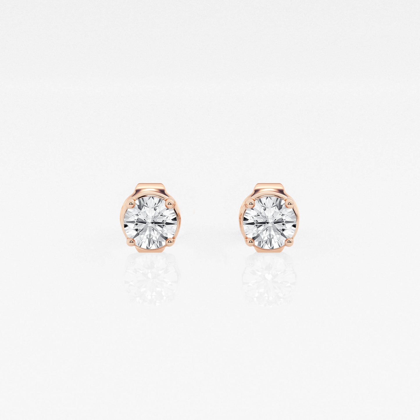 Round Solitaire earrings with four prongs