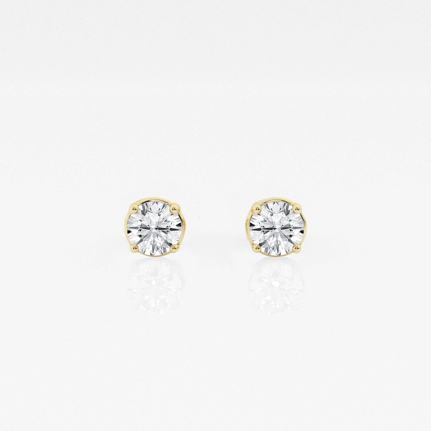 Round Solitaire earrings with four prongs