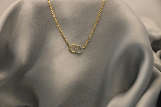 Twin ring pendant with a chain